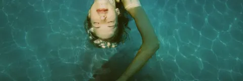 Anonymized Cinematic Underwater Swimmer