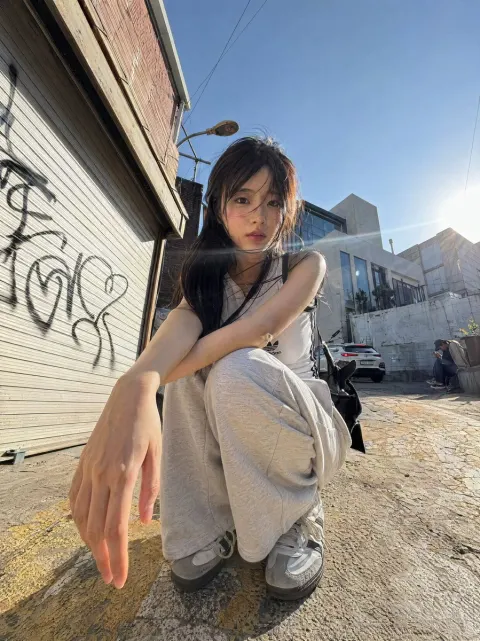 Korean Girl Street Squat Pose