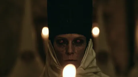 Candlelit Priestess Horror Close-Up