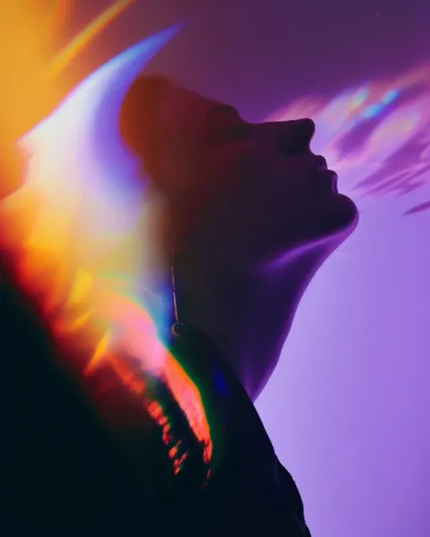 Futuristic Silhouette Against Rainbow on Analog Film