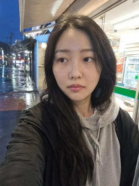 Rainy Night Convenience Store Selfie