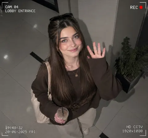 Confident Teen Girl on CCTV Camera