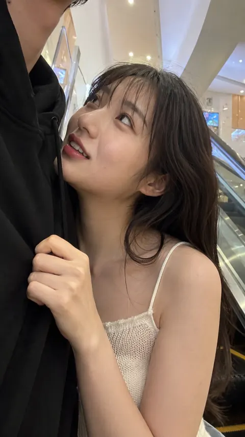 Couple Selfie on Mall Escalator