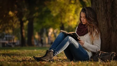 Cozy Autumn Park Reading Lifestyle Photo