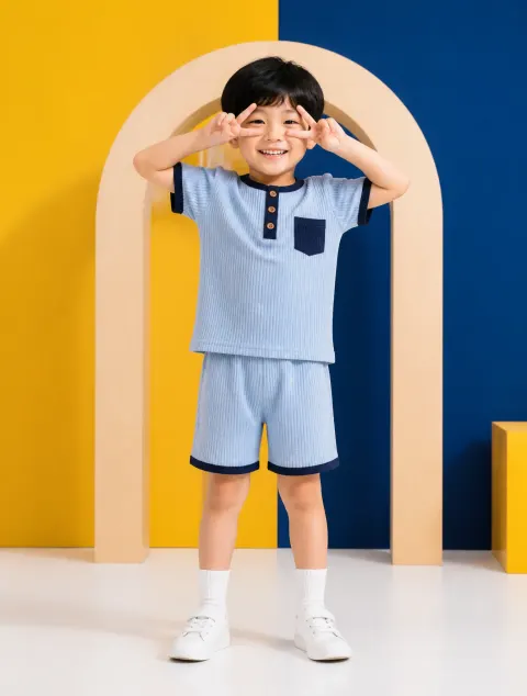 Joyful Boy V-Sign Studio Portrait