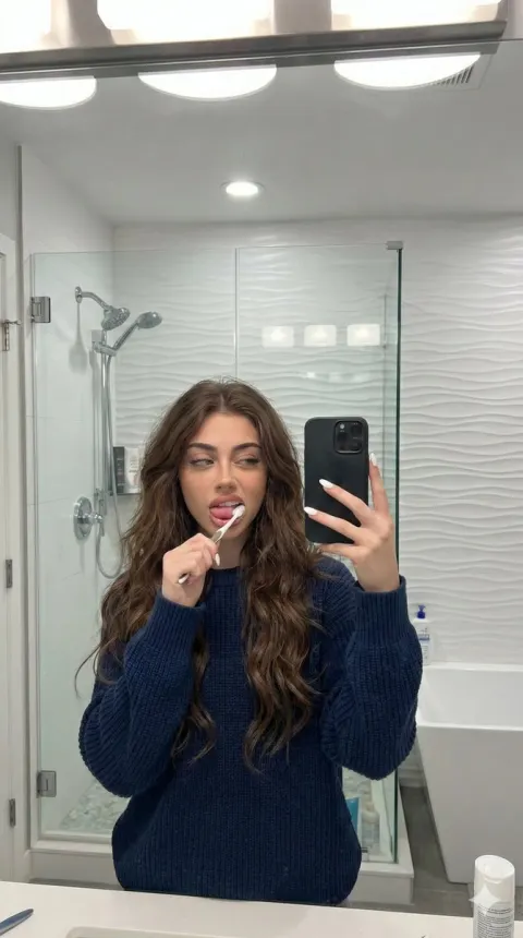 Playful Candid Bathroom Mirror Selfie