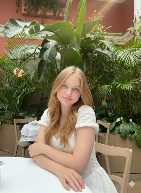 Cinematic Greenhouse Blonde Portrait