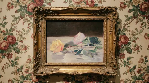 Framed Art on Floral Wall