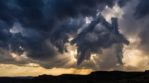Mysterious Subject in Storm Clouds