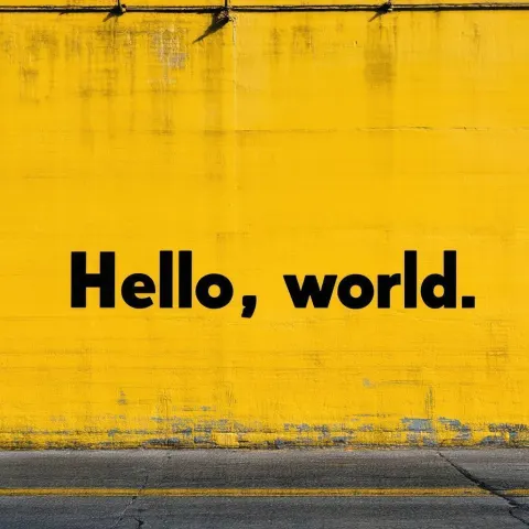Hello World Emblazoned on a Yellow Wall