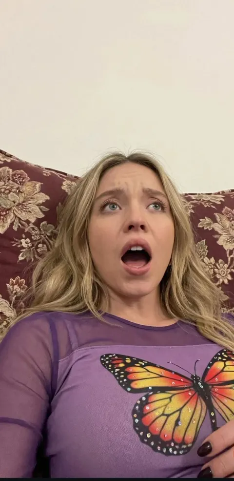 Shocked Blonde in Butterfly Top