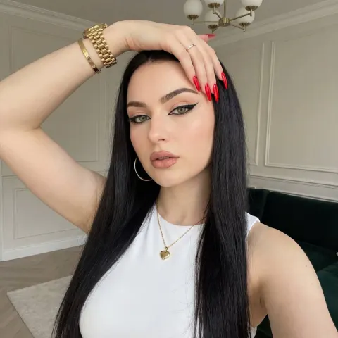 Bold Red Nails Selfie