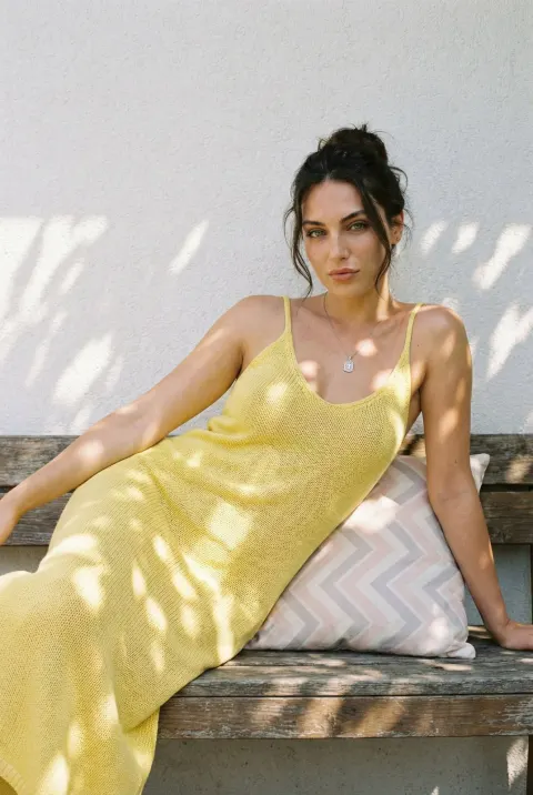 Sunlit Woman in Lemon Knit Dress