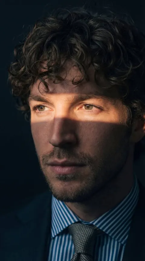Cinematic Chiaroscuro Portrait in Dark Room
