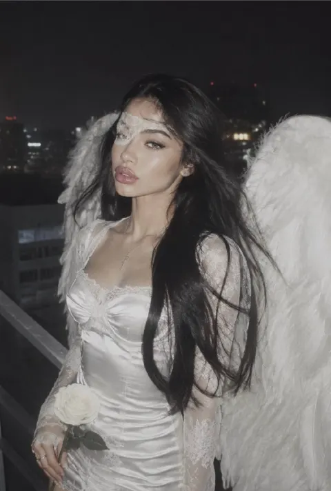 Fallen Angel on Rooftop at Night