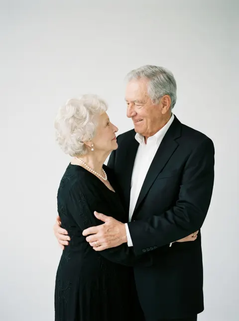Elderly Couple Tender Embrace