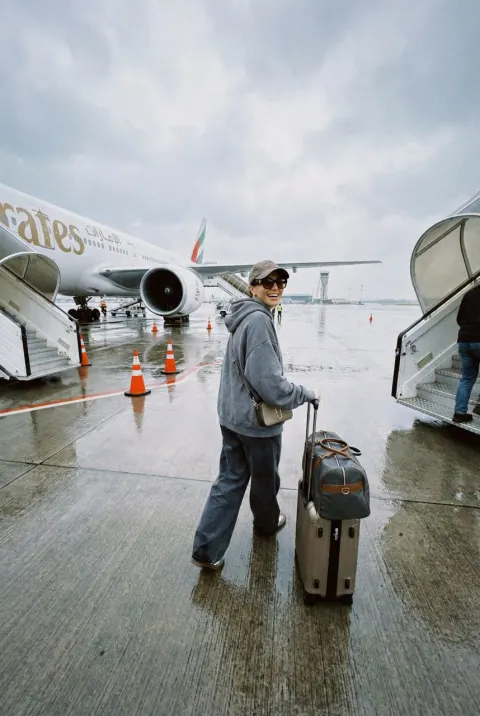 Rainy Airport Boarding Moment