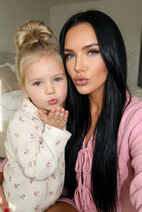 Mother Daughter Blown Kiss Selfie Portrait