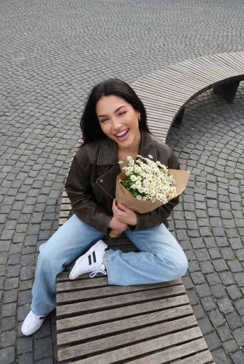 Playful Street Portrait With Flowers