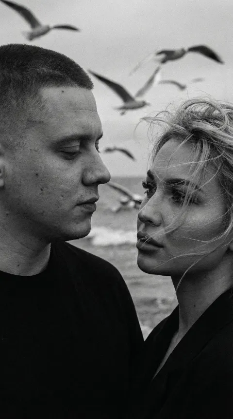 Dramatic B&W Couple Portrait By Sea