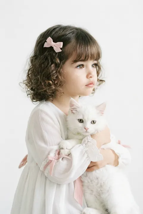 Dreamy Girl with White Cat