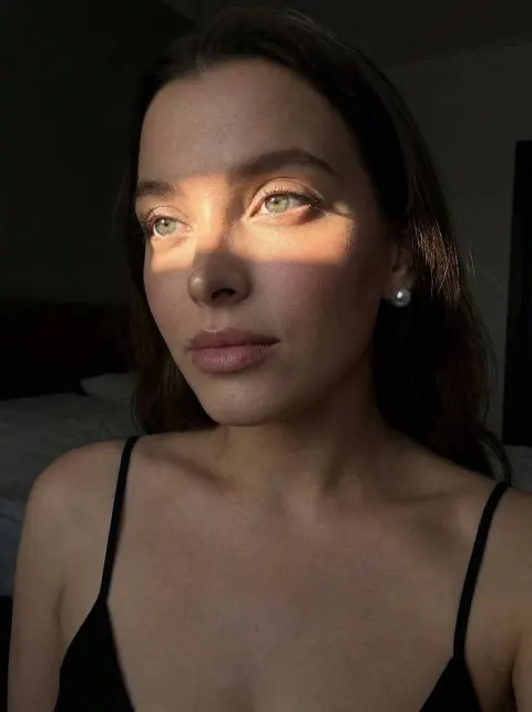 Sunlit Portrait of Young Woman