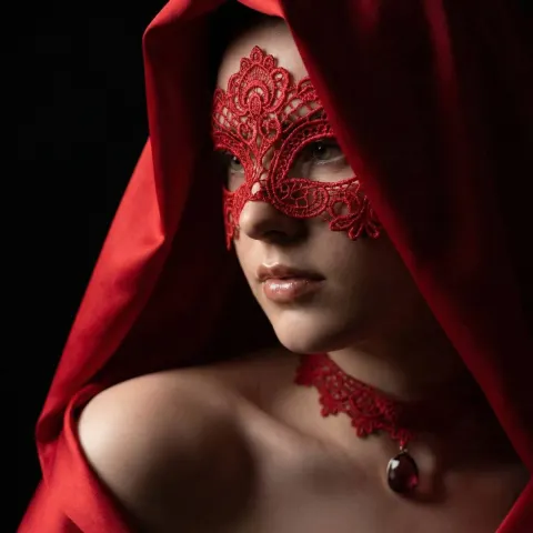 Mystery Behind Red Lace Mask