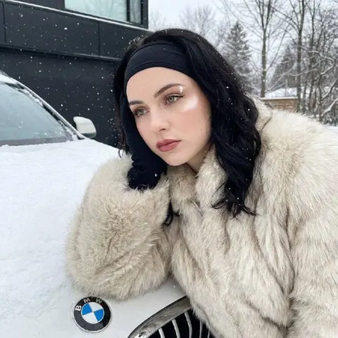 Snowy Winter Fashion Portrait on BMW
