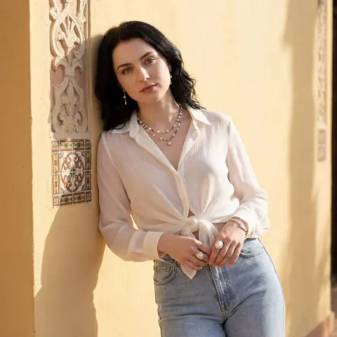 Sunlit Woman Relaxed Portrait