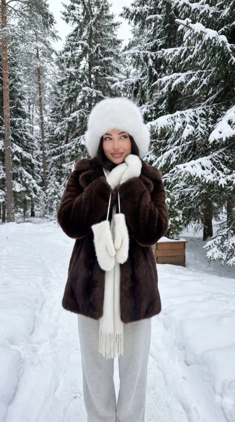 Cozy Winter Portrait in Snowy Pines