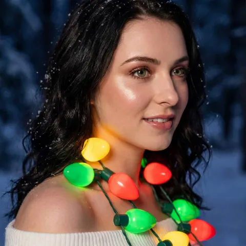 Festive Girl Portrait In Snowy Night