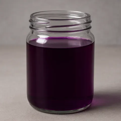 Transparent Glass Jar Filled with a Deep Violet
