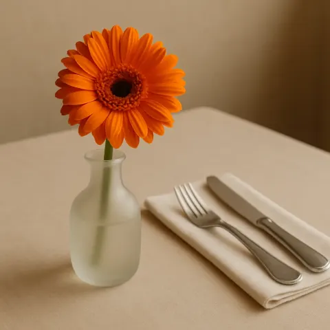 Single Orange Gerbera Daisy in a Frosted Glass Vase
