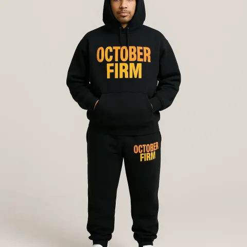 Person Wearing a Black Hoodie and Sweatpants Set