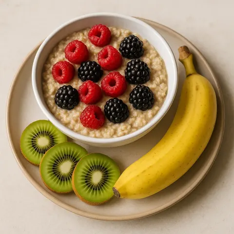 Bowl of Oatmeal Topped with Raspberries and Blackberries