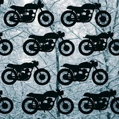 Coolly Backlit Cafe Racer Moped Silhouette