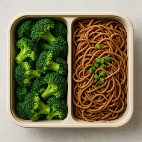 Bento-style Meal Featuring a Container of Cooked Broccoli