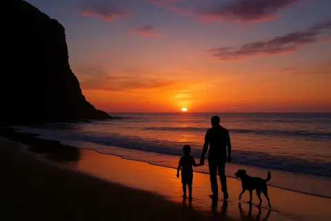 Serene Beach at Sunset with a Silhouetted Cliff