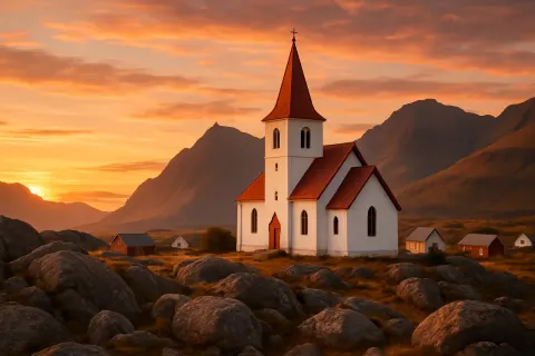 White Church with Steep Red Roofs Sits Amidst Rocky Terrain