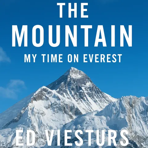 Snow-covered Mountain Peak Surrounded by a Blue Sky