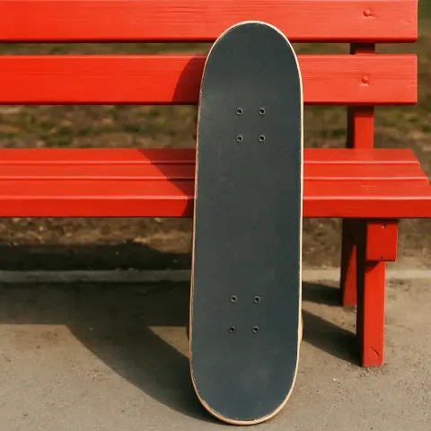 Photograph Showing a Skateboard Propped Against a Bench