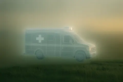 Ghostly Translucent Ambulance in Profile Glides Across Expansive Grassy Plains