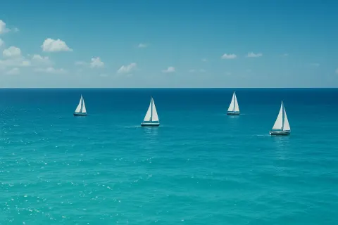 Few Distant Sailboats Glide Across a Vast