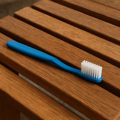 Wooden Bench with a Blue Toothbrush
