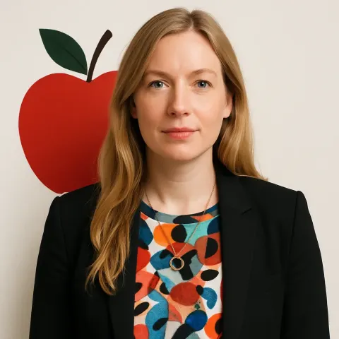 Woman with Long Blonde Hair Wearing a Dark Blazer