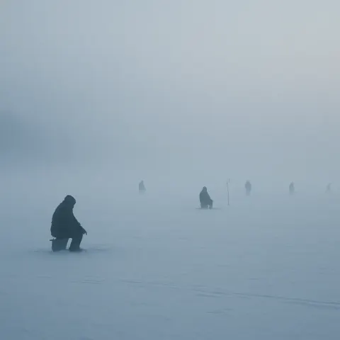 Handful of Distant Figures Are Barely Visible