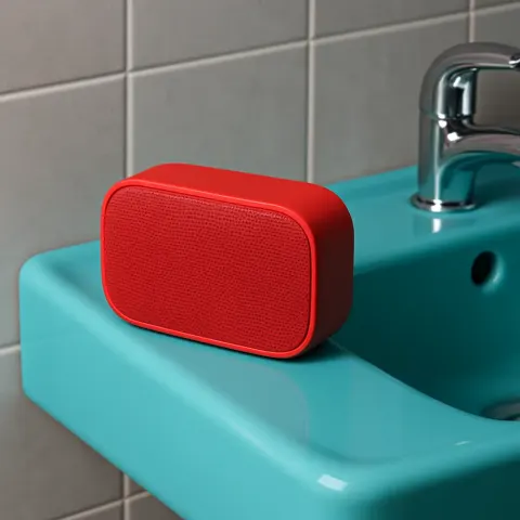 Small Red Speaker Featuring a Stylish