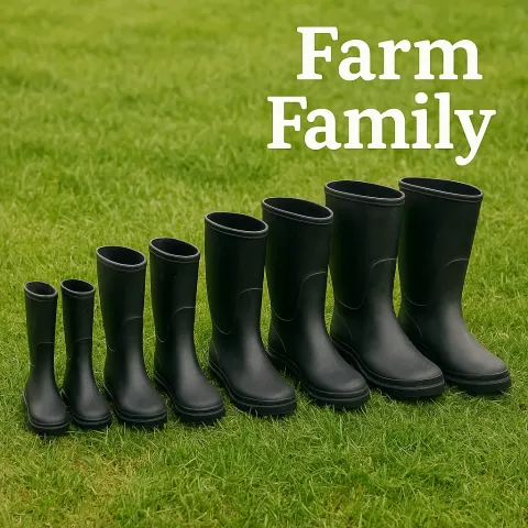 Six Black Rubber Boots Lined Up on Green Grass