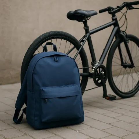 Picture Depicting a Backpack Propped Up Against a Bicycle