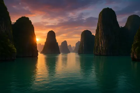Towering Limestone Cliffs Rise Above Tranquil Turquoise Waters